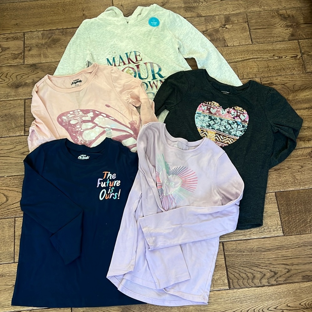 Size 7 girls shirts from Oshkosh, Carters, and Jumping Beans. Some NWTs